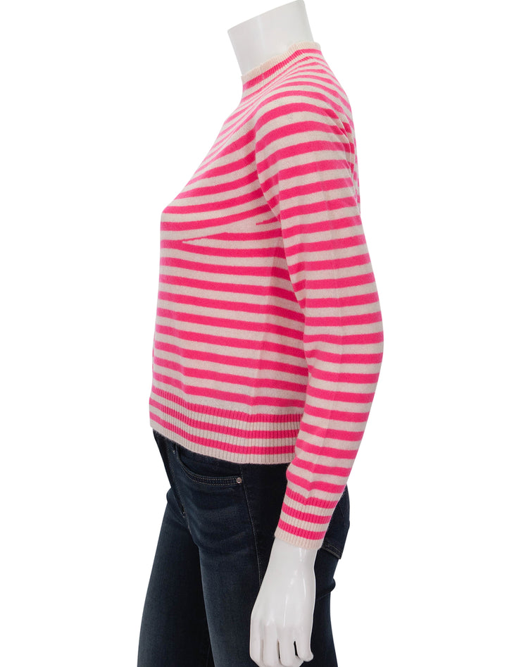 Side view of Jumper 1234's Vary Stripe Crew in Oatmeal and Neon Pink.