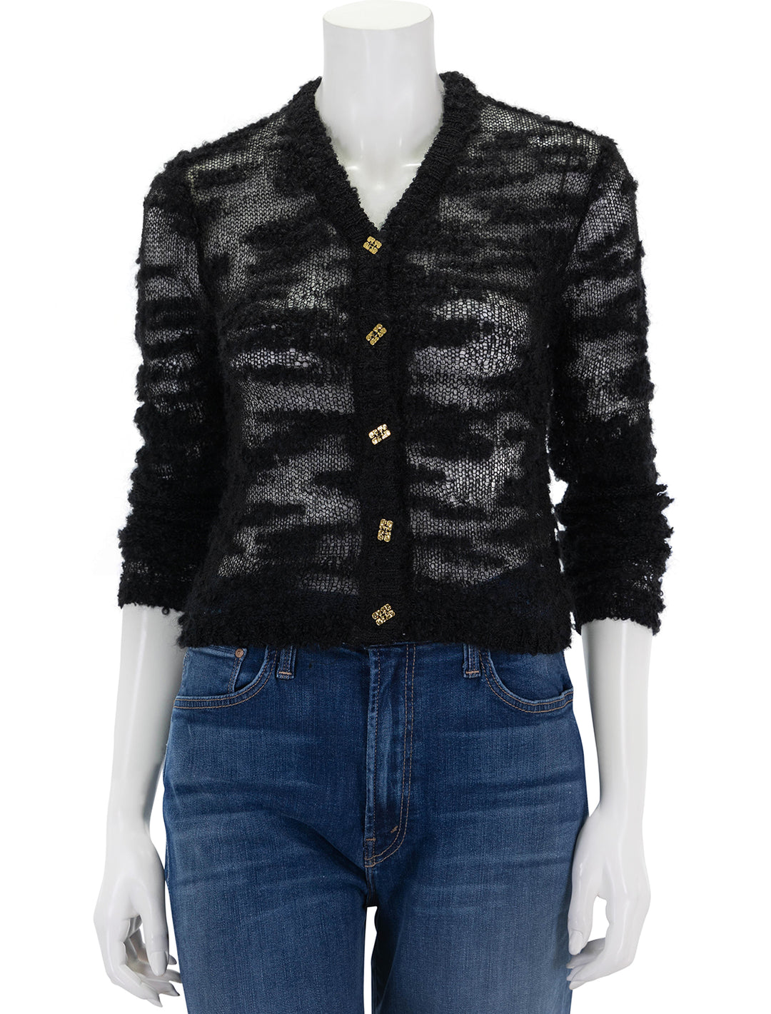 Front view of GANNI's boucle cardigan in black.