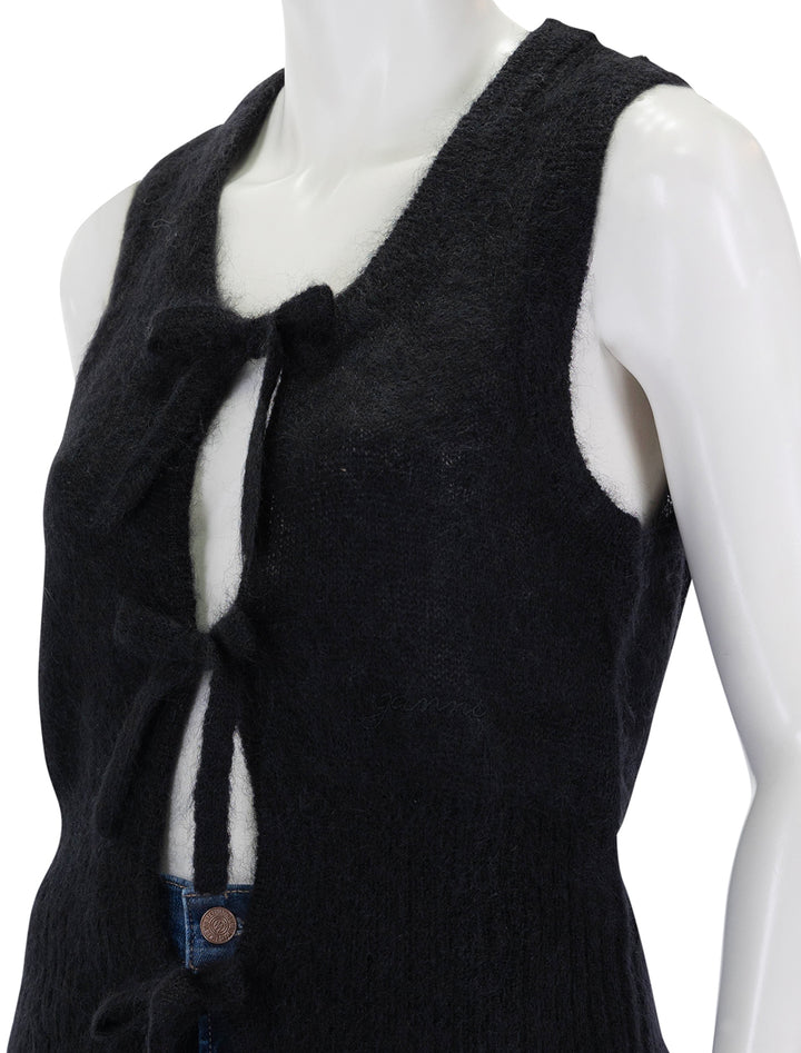 Close-up view of Ganni's tie string vest in black.