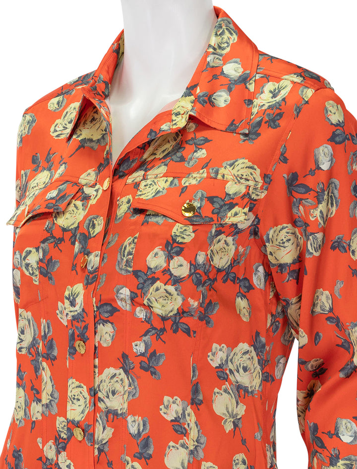 Close-up view of GANNI's printed satin shirt in poinciana.