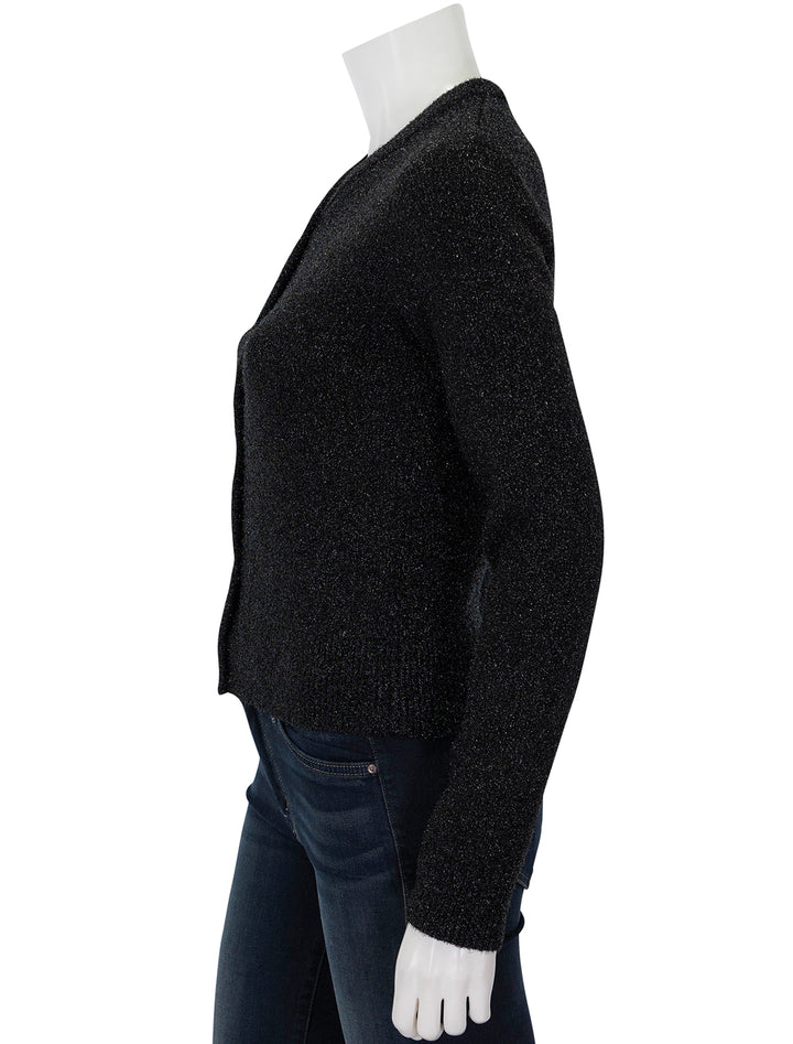 Side view of GANNI's sparkle cardigan in black.