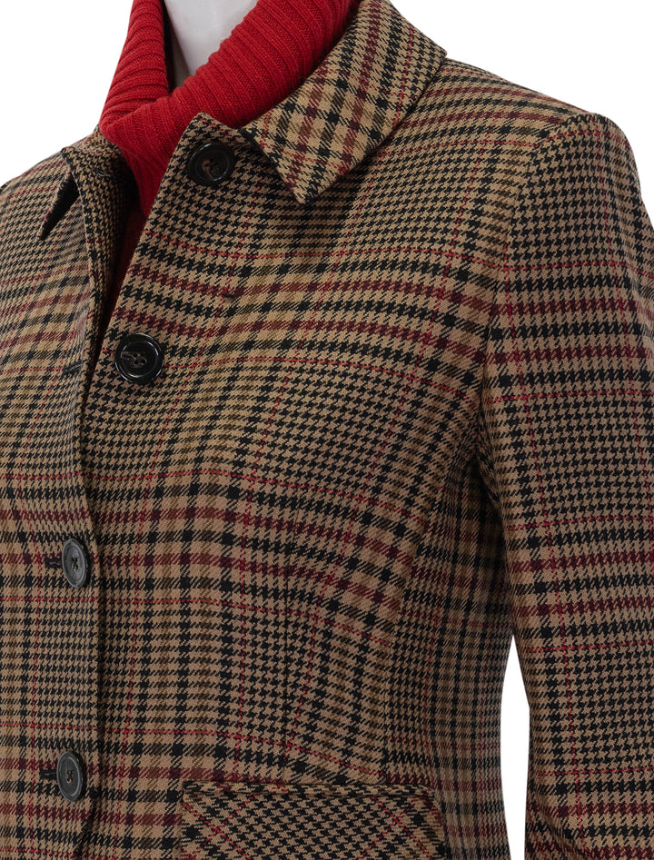 Close-up view of Veronica Beard's aire dickey jacket in camel and black plaid.