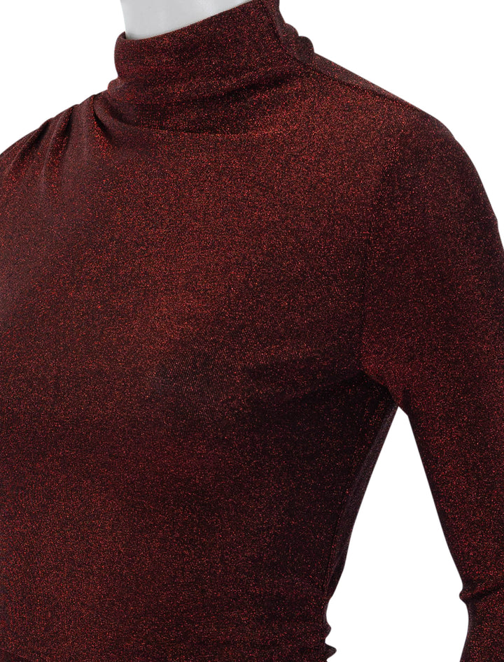 Close-up view of Veronica Beard's mylie top in crimson lurex.