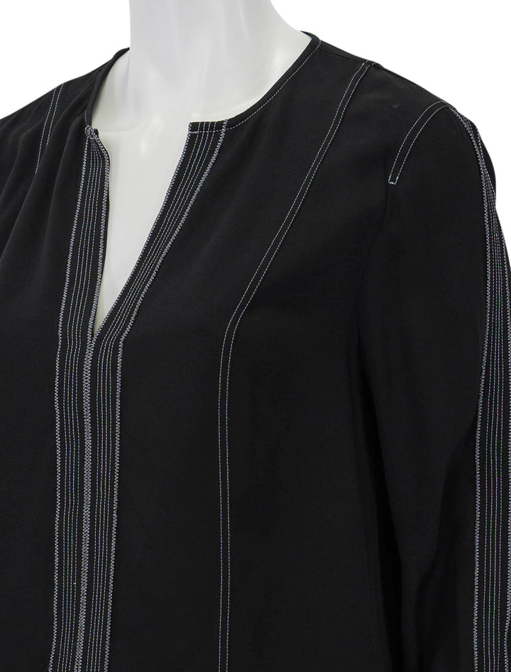 Close-up view of Ulla Johnson's safi blouse in noir.