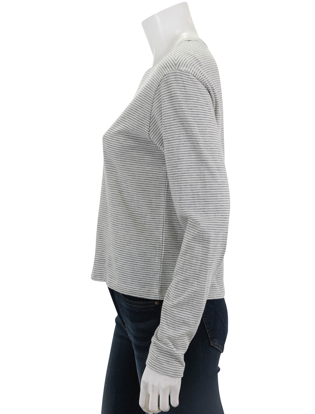 Side view of ATM's micro stripe long sleeve crew neck tee in grey and white.