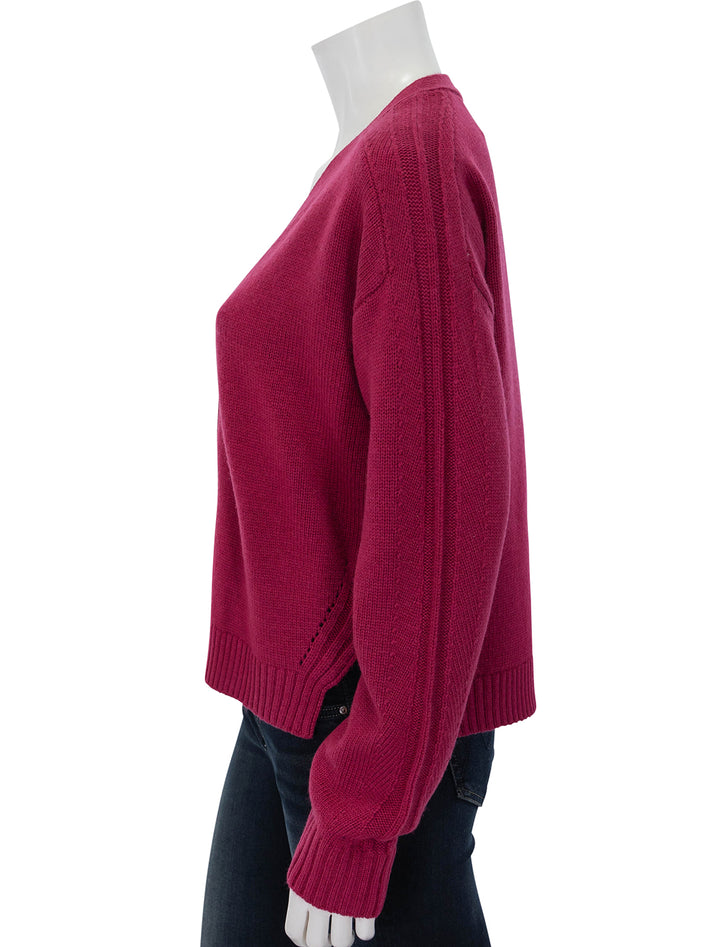 Side view of ATM's merino blend cardigan in rubellite.