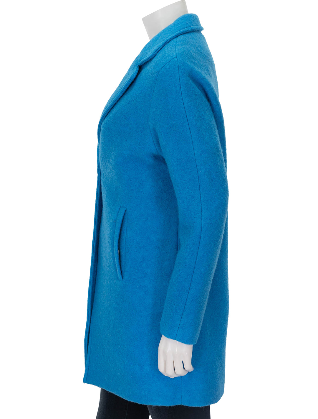 Side view of Vilagallo's alberta coat in bright blue.