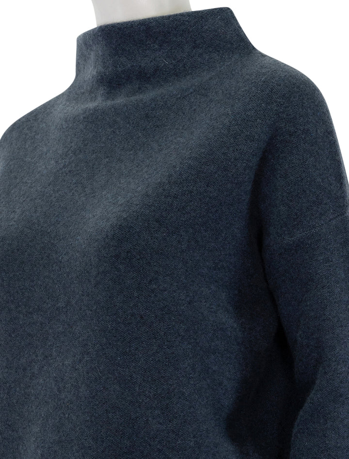 Close-up view of Vince's boiled funnel neck pullover in heather tidestone.