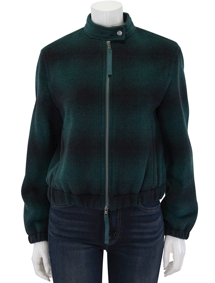 Front view of Vince's shadow plaid bomber in juniper, zipped.