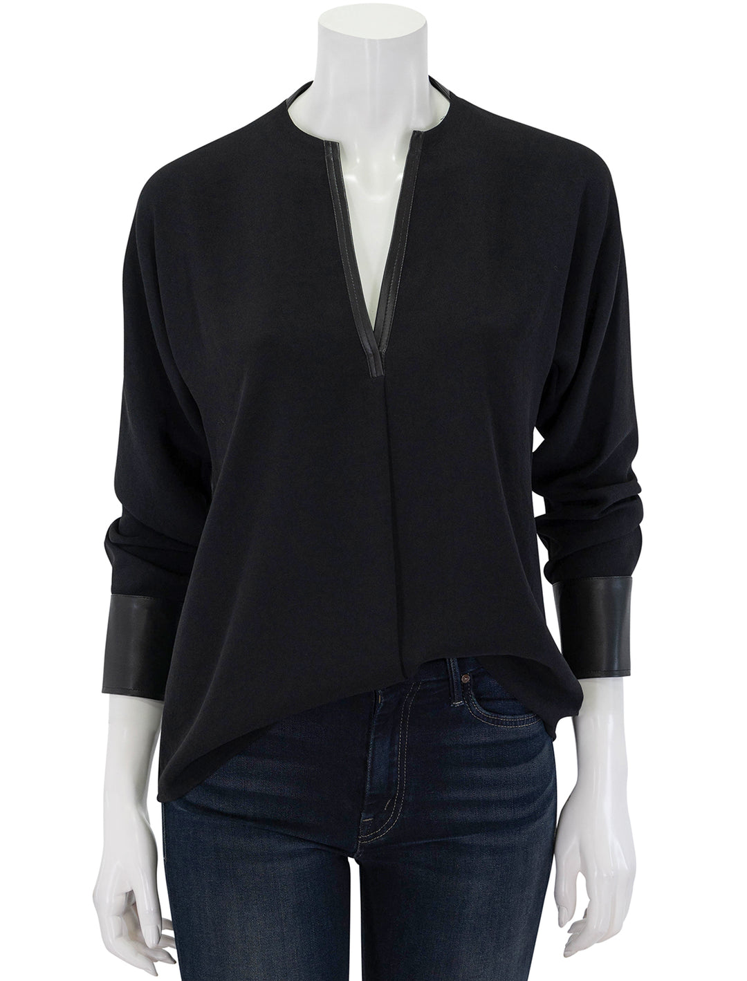 Front view of Vince's leather trim dolman sleeve blouse.