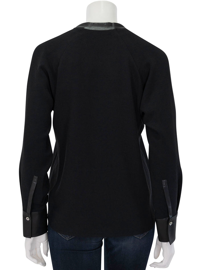 Back view of Vince's leather trim dolman sleeve blouse.