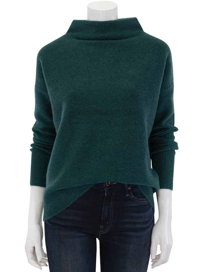 Front view of Vince's boiled funnel neck pullover in heather jade.