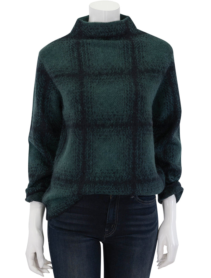 Front view of Vince's shadow plaid funnel neck pullover in juniper.