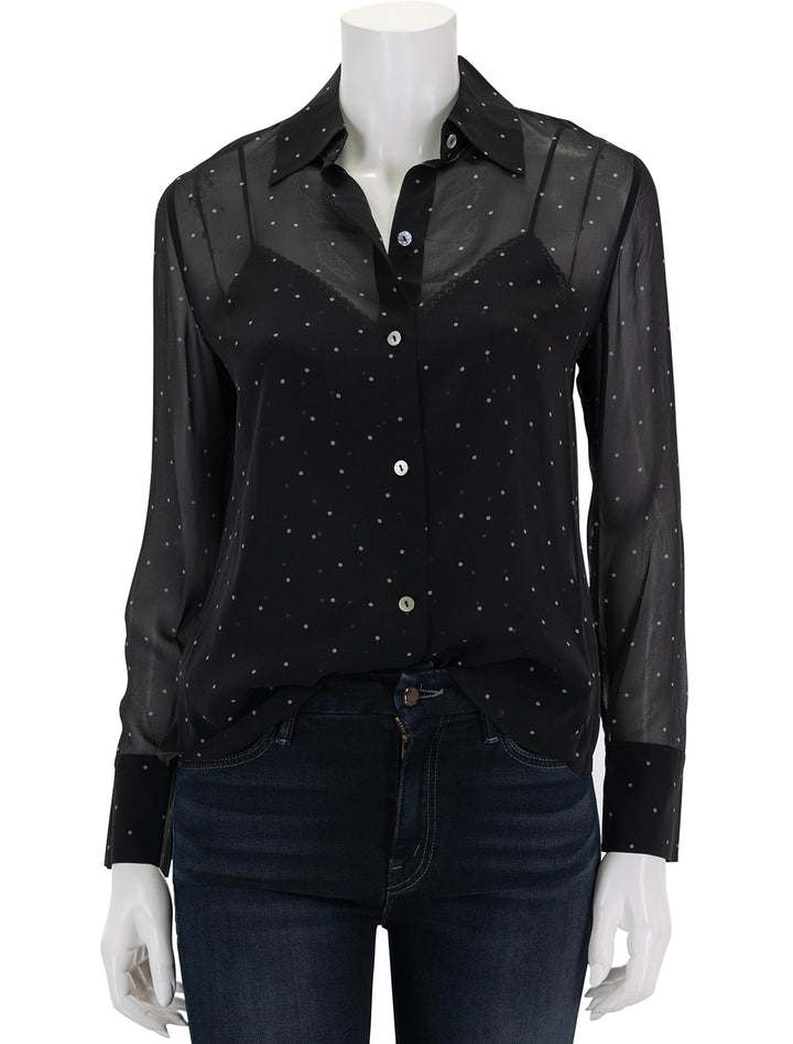 Front view of Vince's sheer dot blouse with lace trim cami in black