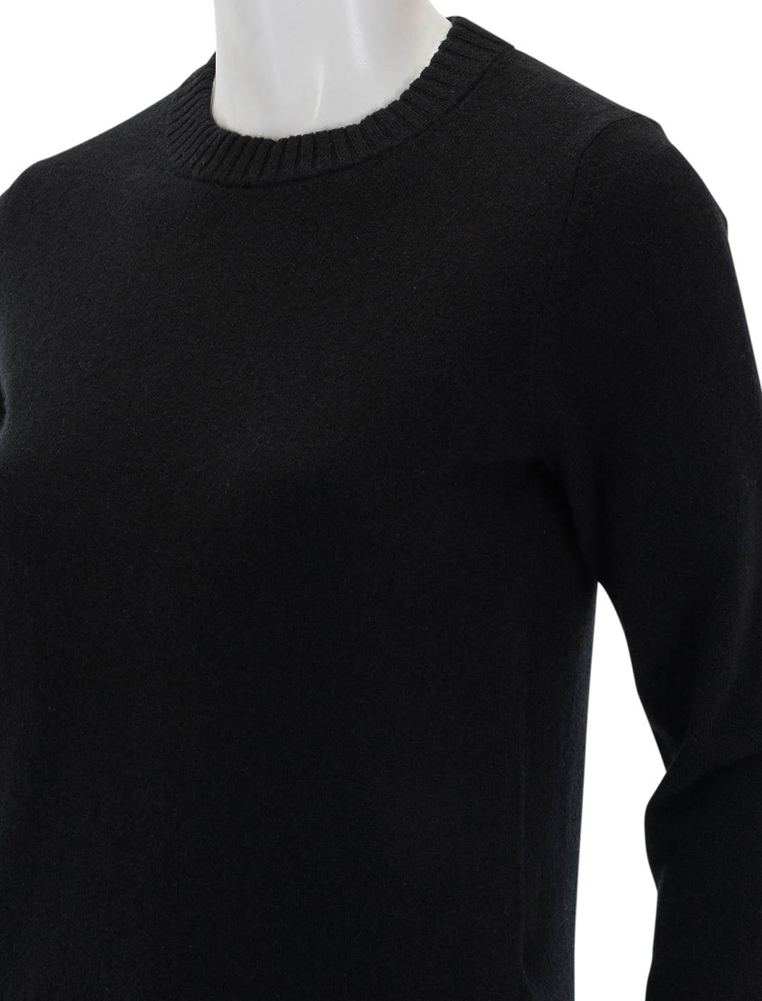 close up view of classic crew neck pullover in black