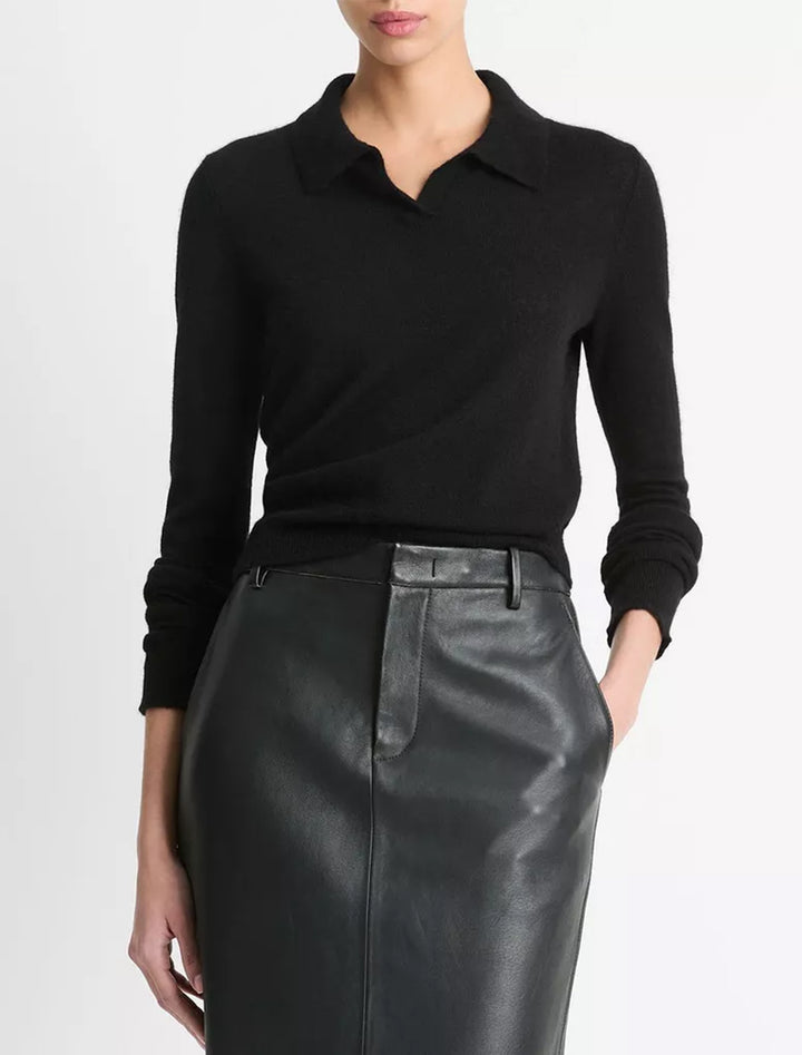 Model wearing Vince's silk blend collar crew neck pullover in black.