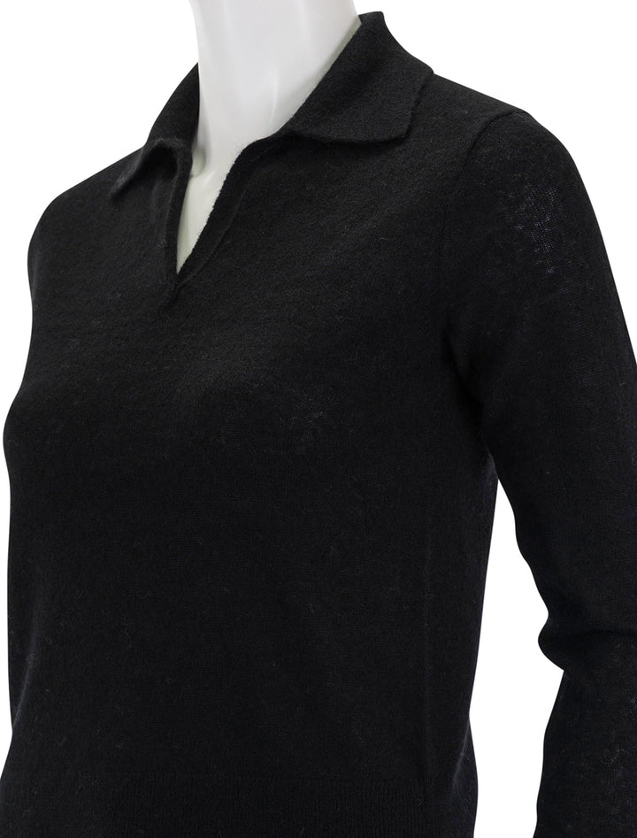 Close-up view of Vince's silk blend collar crew neck pullover in black.