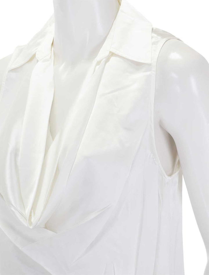 Close-up view of L'Agence's colter cowlneck sleeveless blouse in ivory.