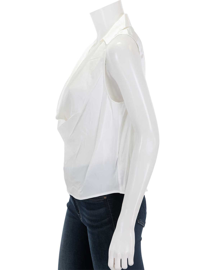 Side view of L'Agence's colter cowlneck sleeveless blouse in ivory.