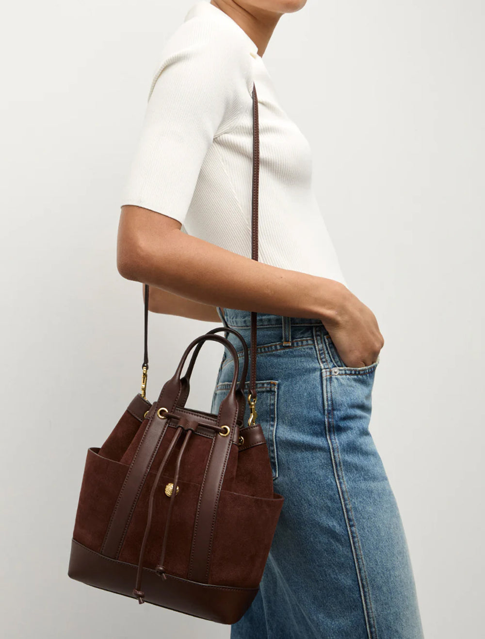 Model wearing Veronica Beard's goody bag in chestnut.