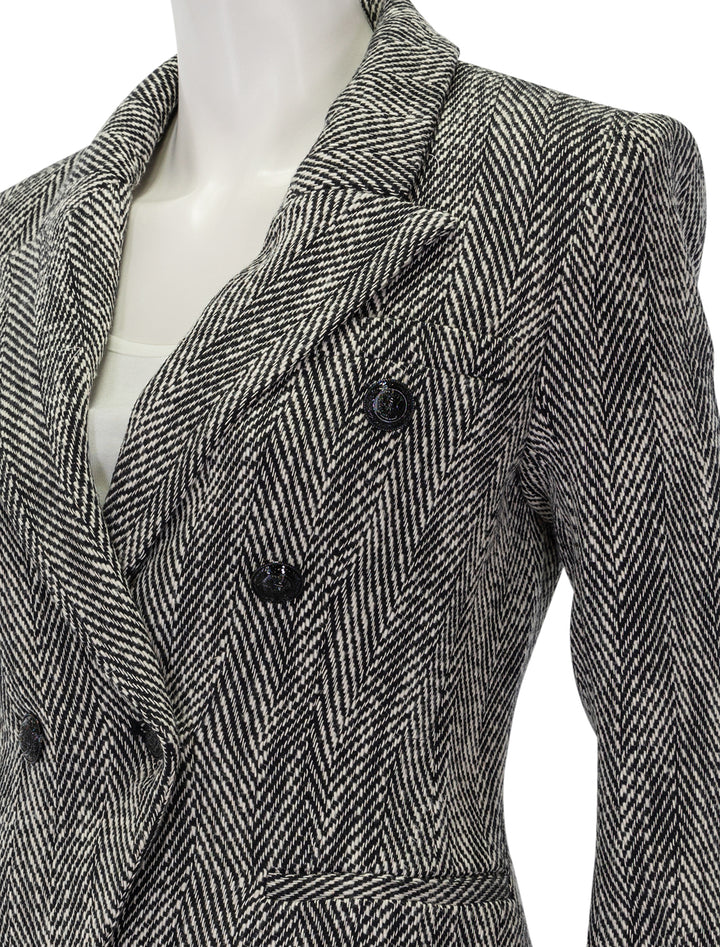 Close-up view of L'Agence's marie double breasted blazer in black and white tweed.