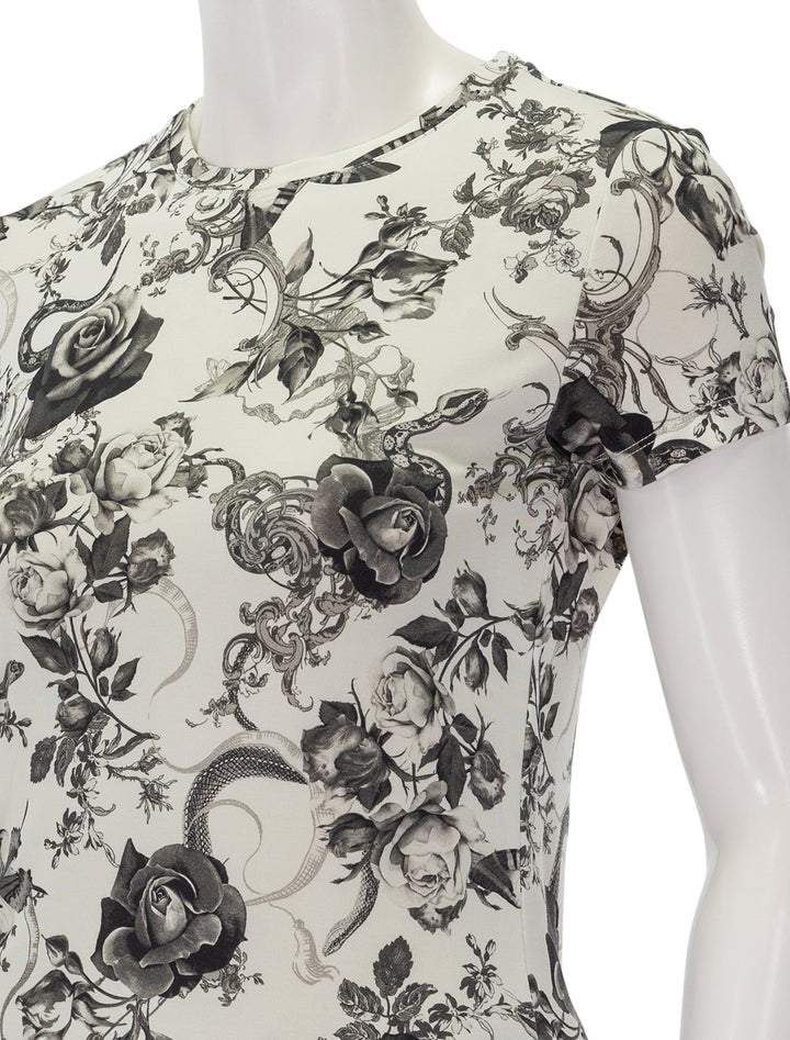 Close-up view of L'agence's ressi tee in ivory and black baroque floral.