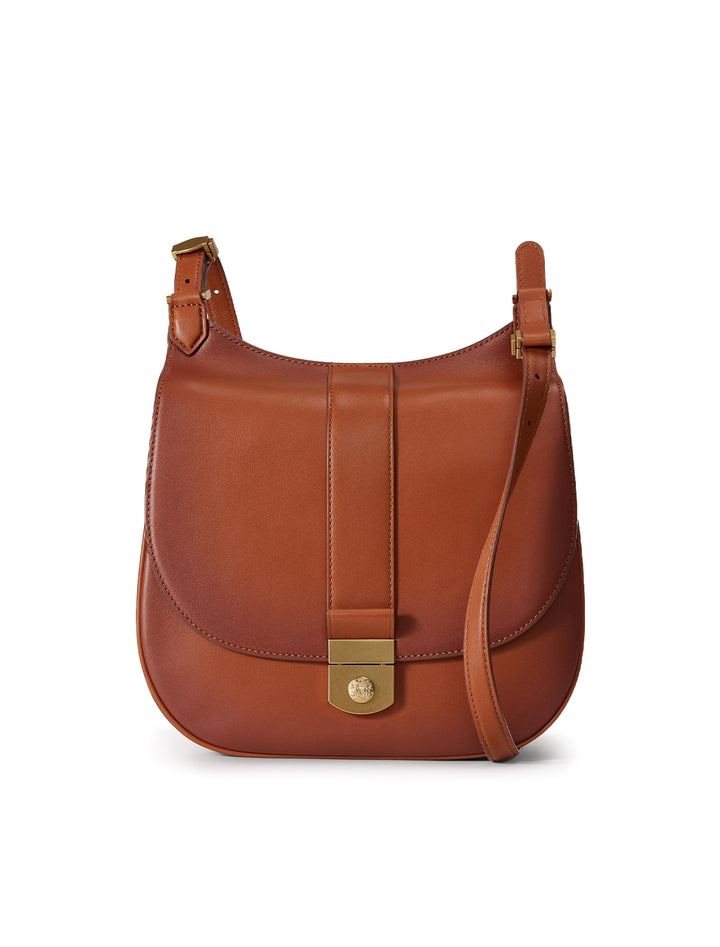 Front view of Veronica Beard's the crest lock messenger bag in burnished hazelwood.