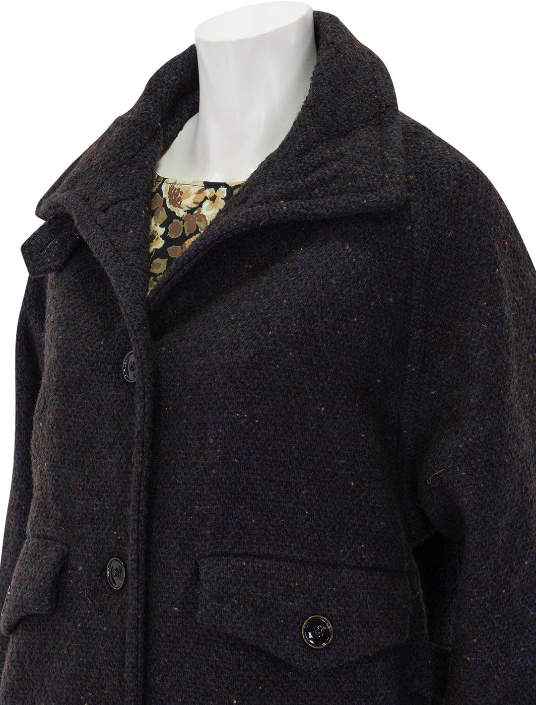 Close-up view of Sessun's lee valley short coat in navy & brown fleck.