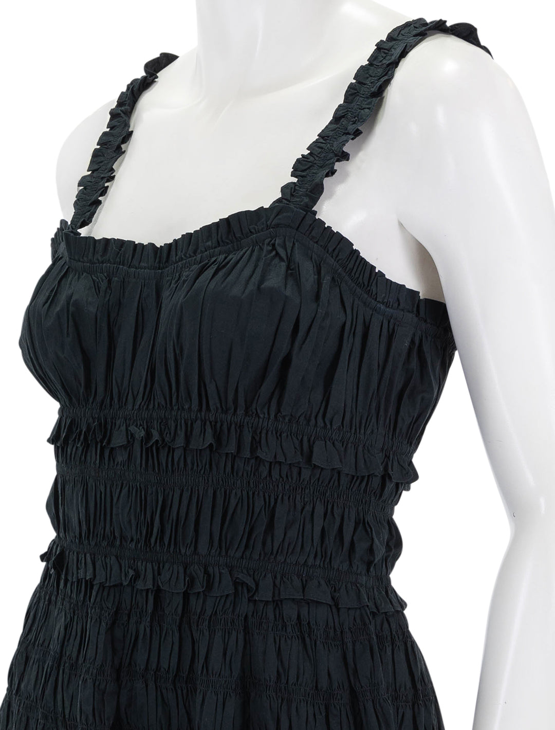 Close-up view of DOEN's marianne dress in black.