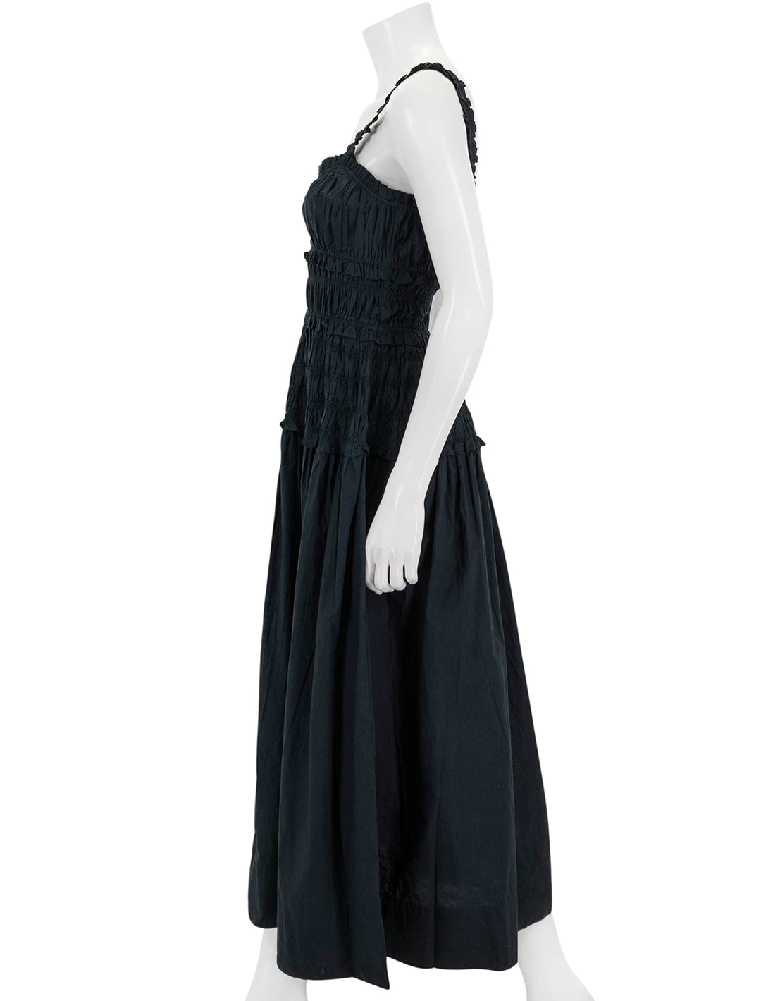 Side view of DOEN's marianne dress in black.