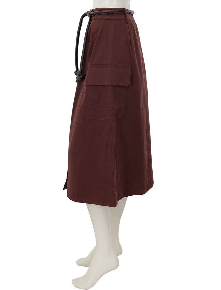 Side view of Sea NY's kerith belted skirt in burgundy.