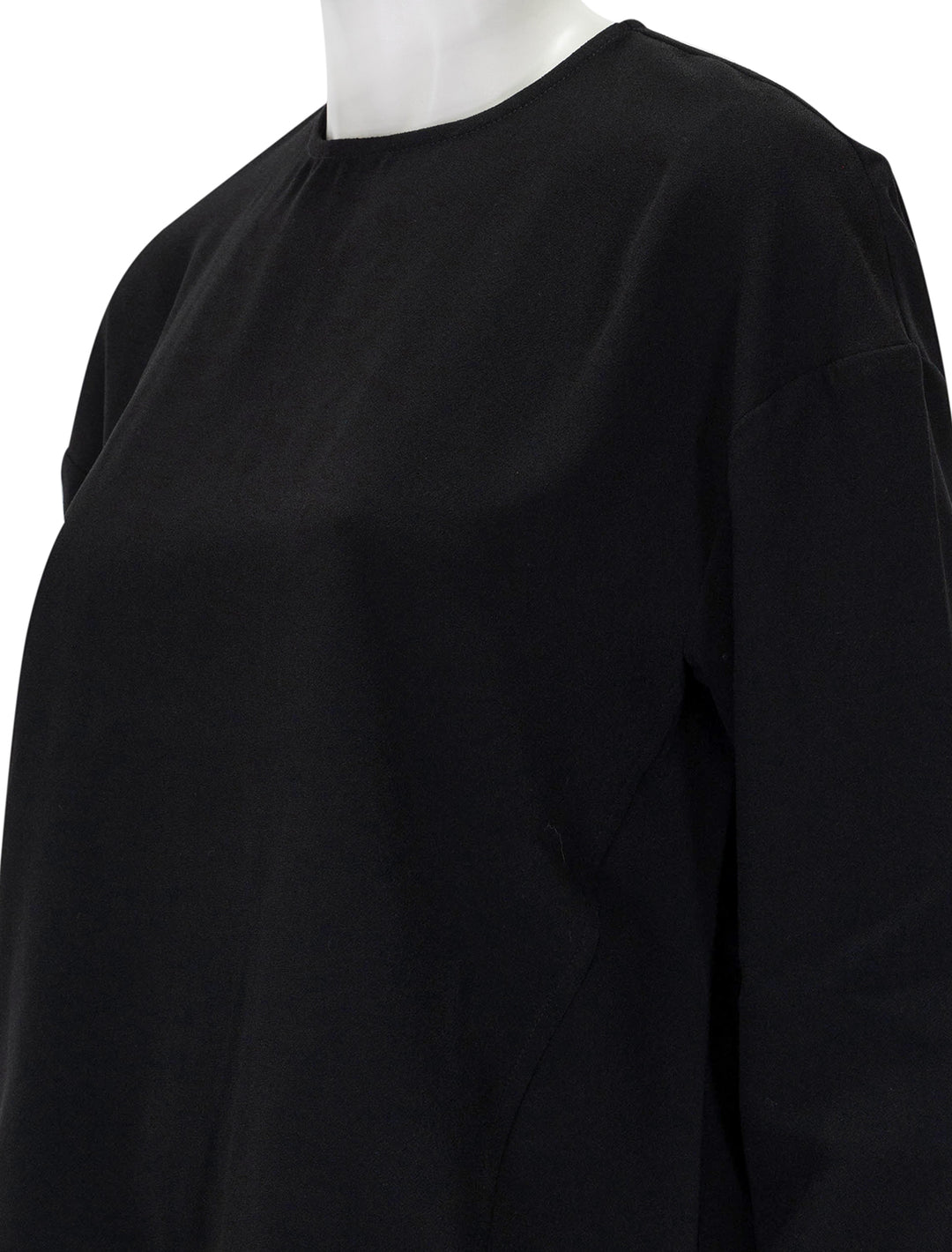 Close-up view of Saint Art's paris blouse in black crepe.