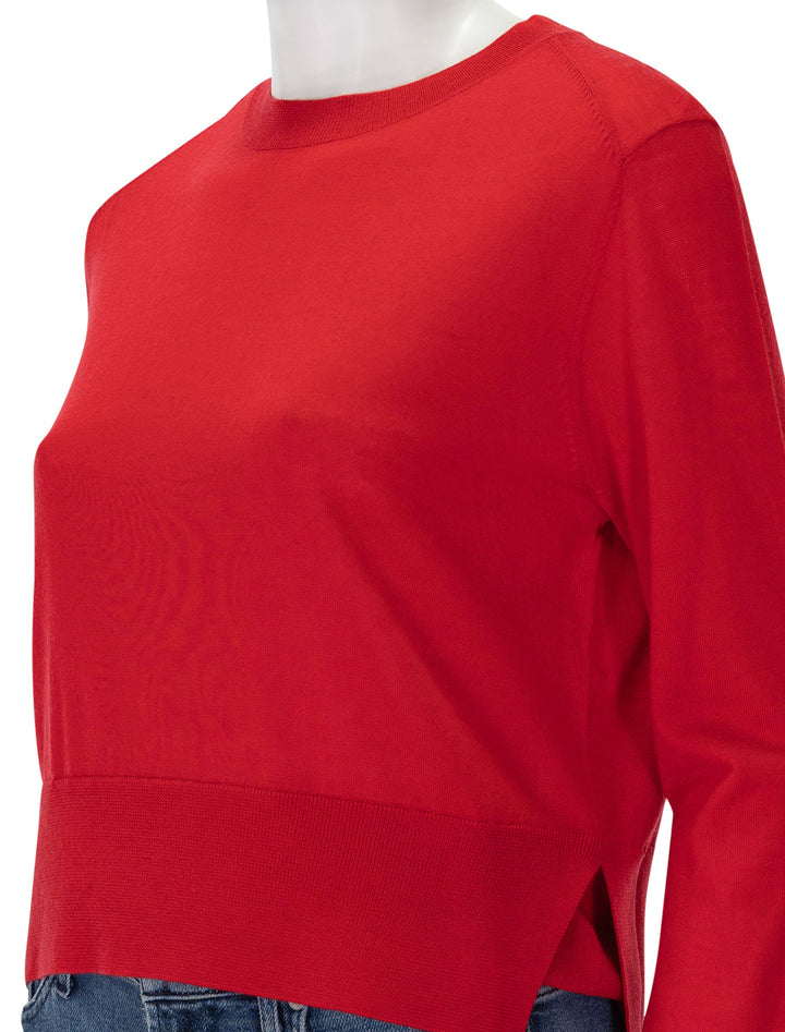 Close-up view of Saint Art's elodie layered crewneck in tomato.