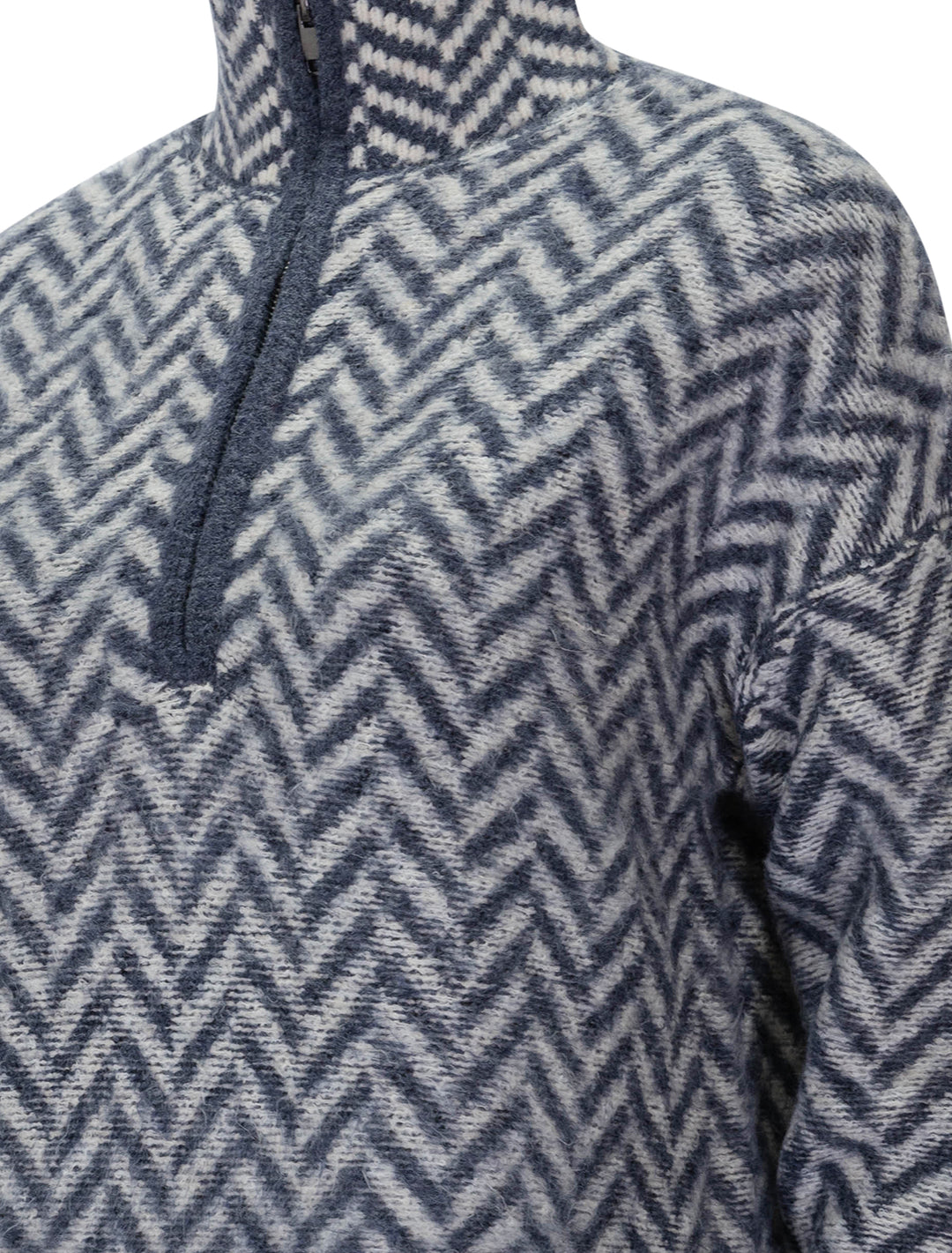 Close-up view of John + Jenn's dominic 1/4 zip in inky herringbone.