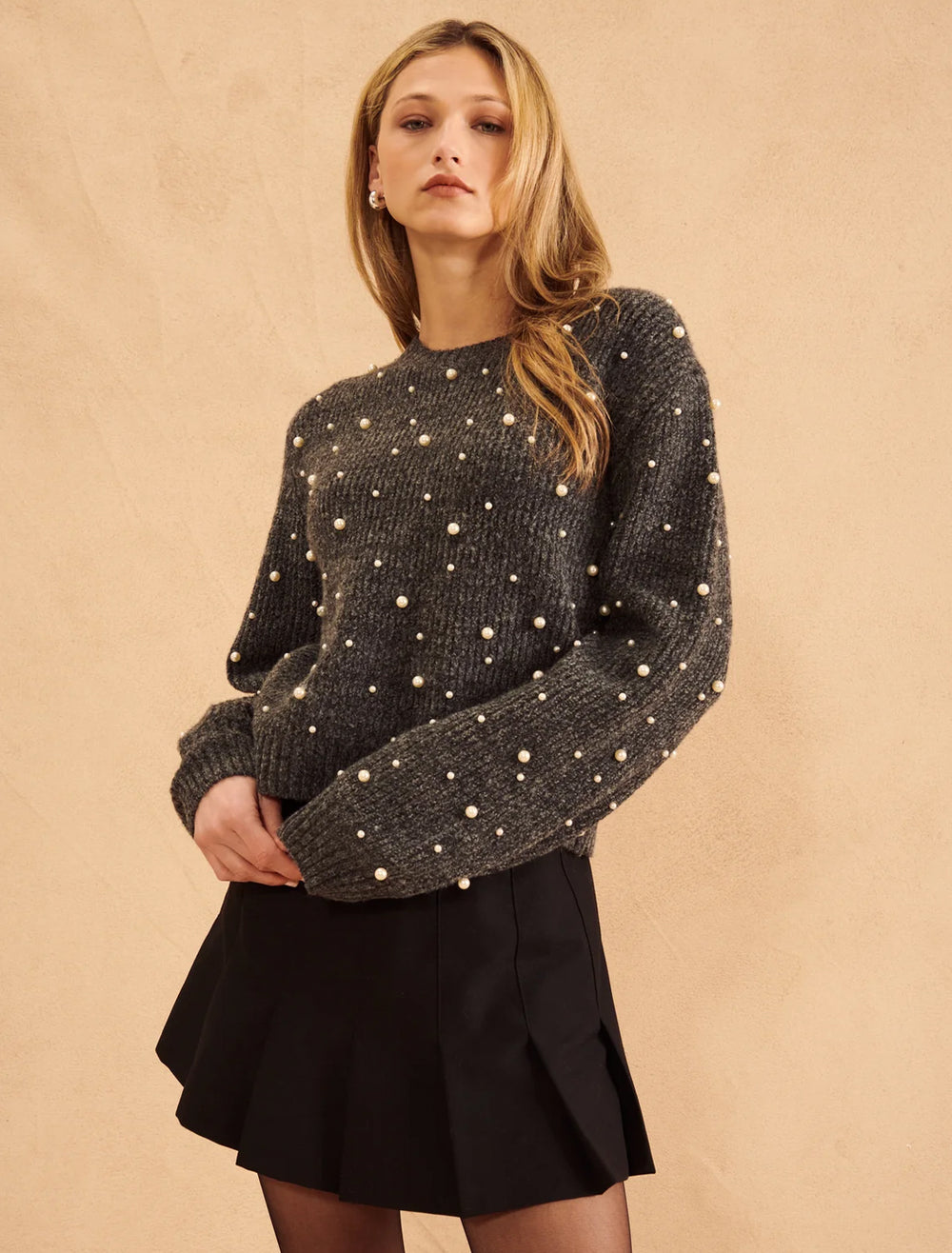 Model wearing John + Jenn's augustus pullover in bejeweled granite.