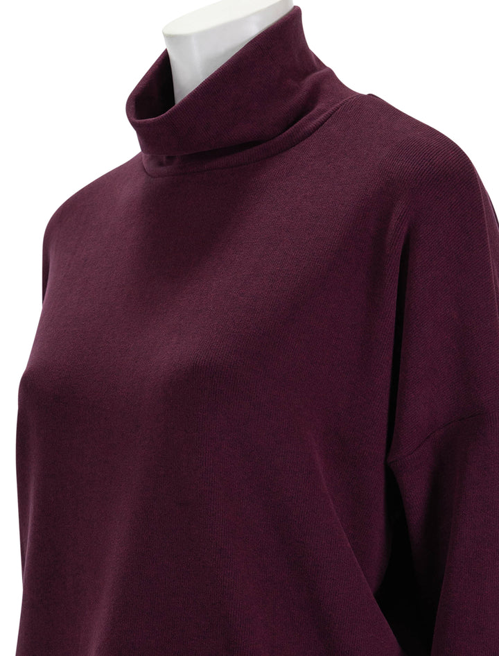 Close-up view of Stateside's Honeyluxe Flatback Rib Dolman Top in Cherry Liquor.