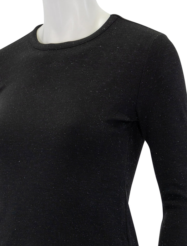 Close-up view of Splendid's isabella shimmer long sleeve tee in black.