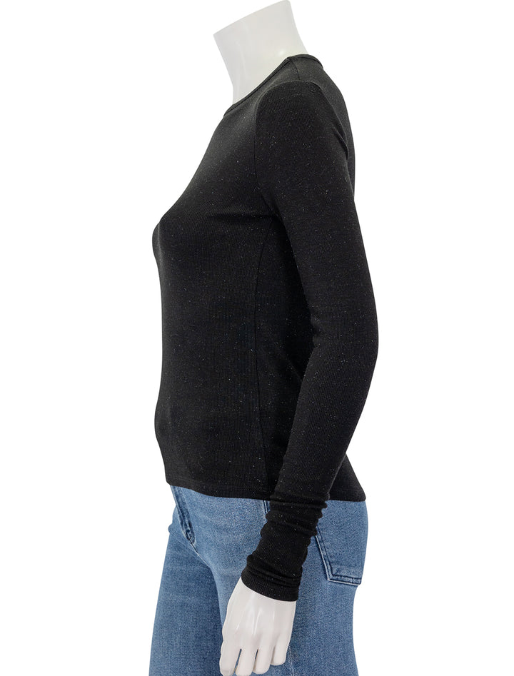 Side view of Splendid's isabella shimmer long sleeve tee in black.