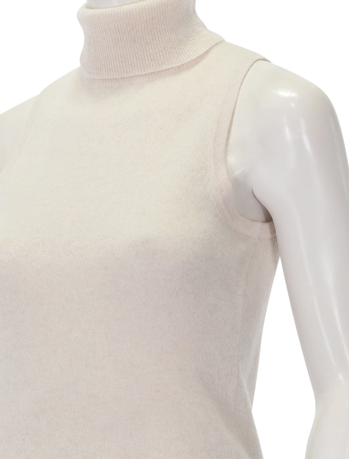 Close-up view of Splendid's tori cashmere turtleneck tank in pale oak heather.