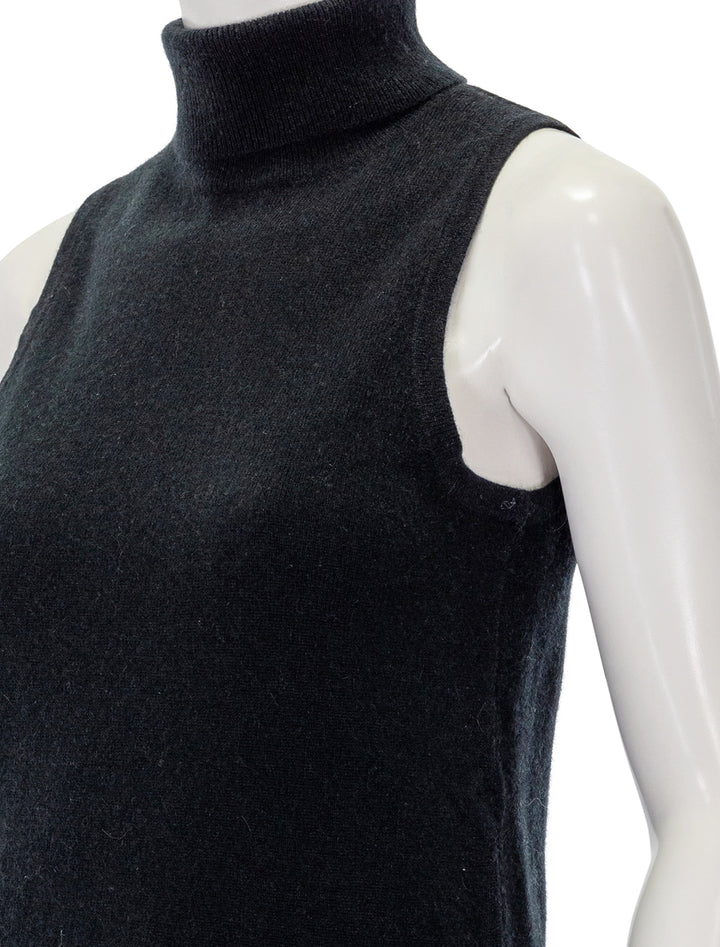 Close-up view of Splendid's tori cashmere turtleneck in black.