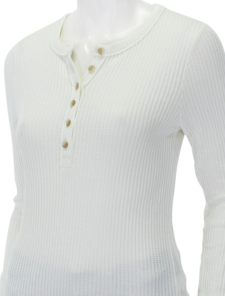 Close-up view of Faherty's legend apres waffle henley in egret.