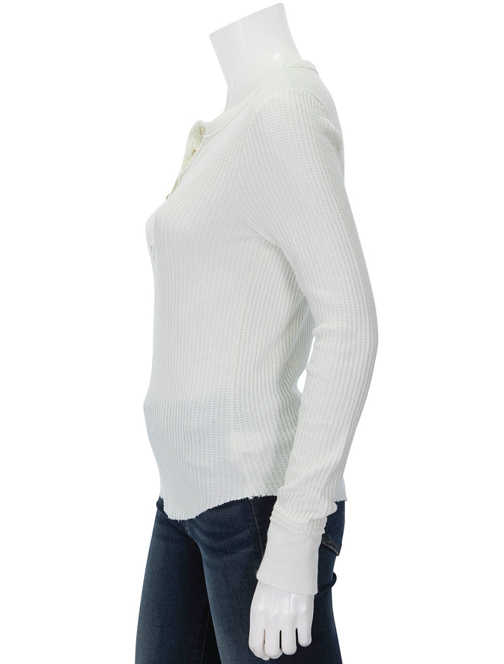 Side view of Faherty's legend apres waffle henley in egret.