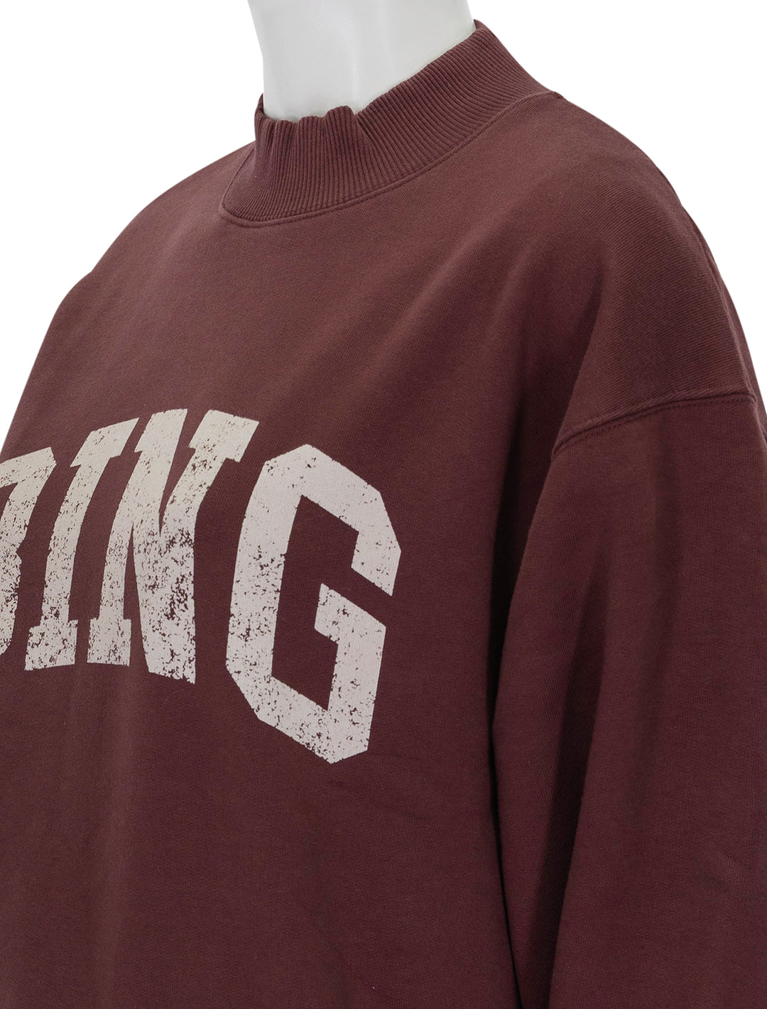 Close-up view of Anine Bing's bradie bing sweatshirt in deep burgundy.