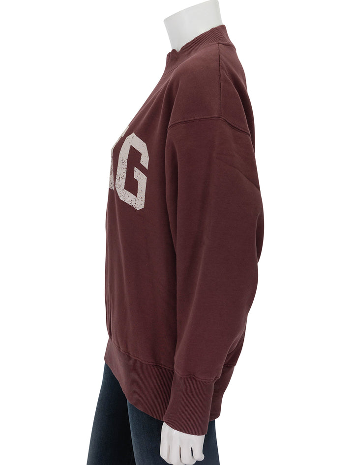 Side view of Anine Bing's bradie bing sweatshirt in deep burgundy.