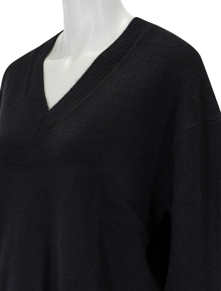 Close-up view of Anine Bing's lee sweater in black.