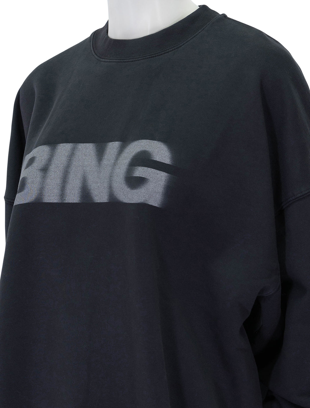 Close-up view of Anine Bing's miles blur sweatshirt in vintage black.