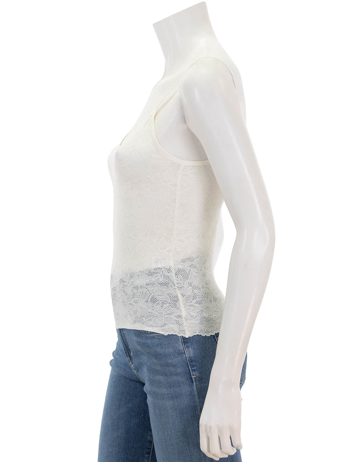Side view of Eberjey's soft stretch recycled lace cami in ivory.