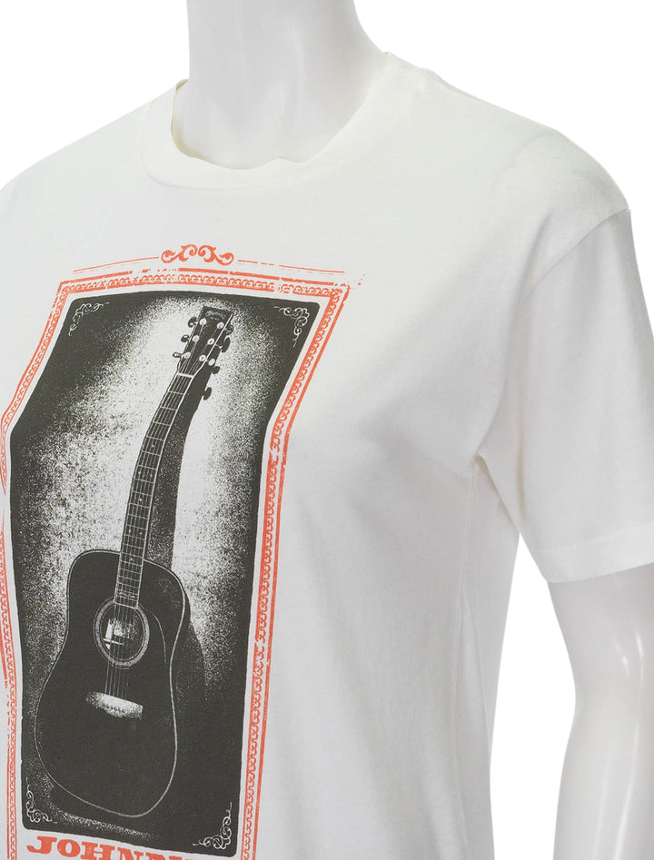 Close-up view of Daydreamer's johnny cash guitar weekend tee.