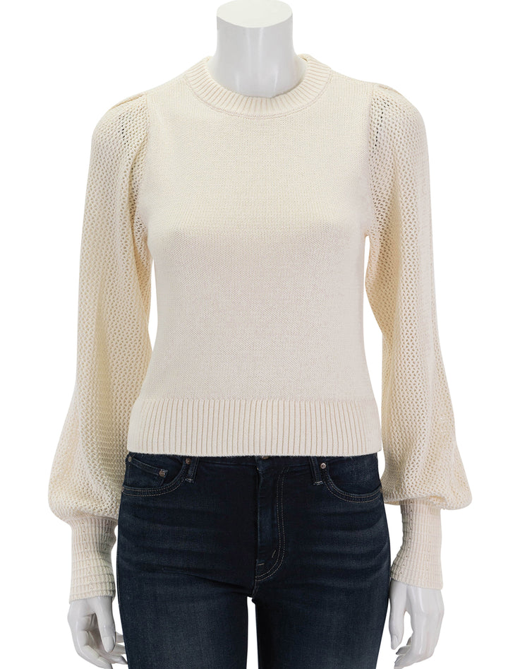 front view of pointelle sleeve crewneck sweater in cream