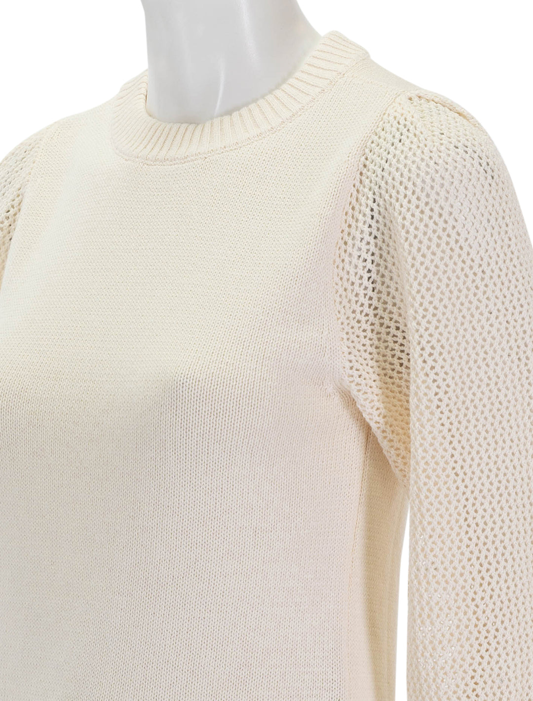 close up view of pointelle sleeve crewneck sweater in cream